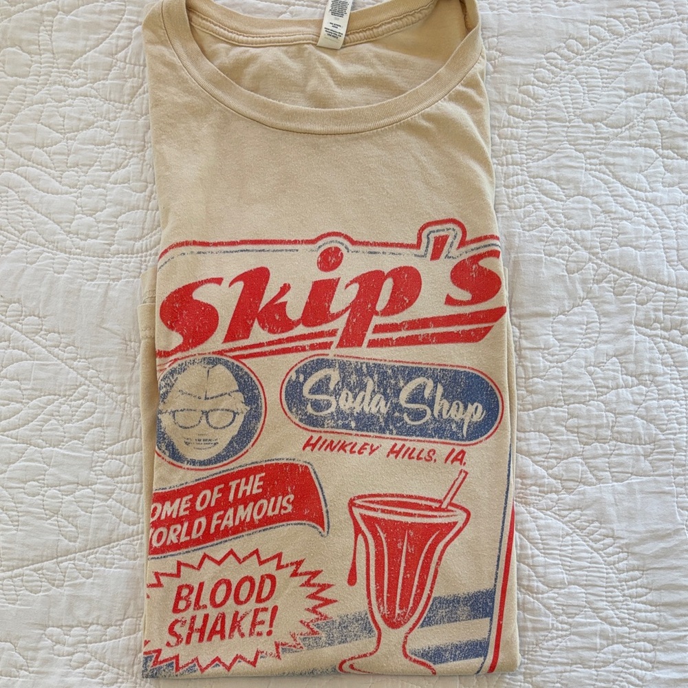 The ‘Burbs-inspired Bella Canvas Beige Tee with Retro Soda Shop Graphic